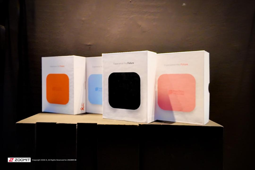 باکس‌های محصول نت‌باکس (Netbox) با رنگ‌های نارنجی، آبی، مشکی و صورتی